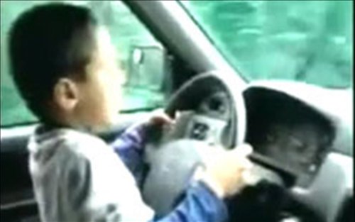 7 Year Old Driving An SUV In Quebec With His Family